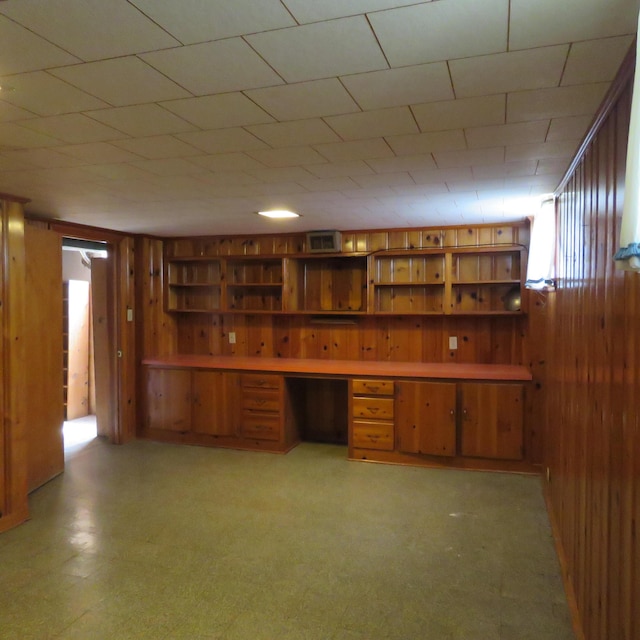 383 Main St, New Castle, VA 24127 - unfurnished office featuring wood walls, built in study area, and light floors