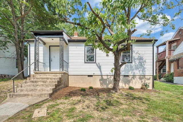2109 Colgate St NE, Roanoke, VA 24012 - view of front of property with a front yard, crawl space, and a chimney