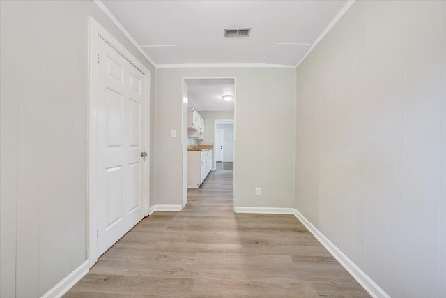 2109 Colgate St NE, Roanoke, VA 24012 - hall with light wood-style flooring, ornamental molding, and baseboards