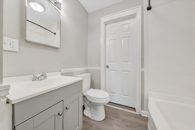 2109 Colgate St NE, Roanoke, VA 24012 - bathroom with vanity, wood finished floors, and toilet