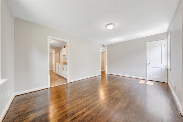 2109 Colgate St NE, Roanoke, VA 24012 - spare room featuring wood finished floors and baseboards