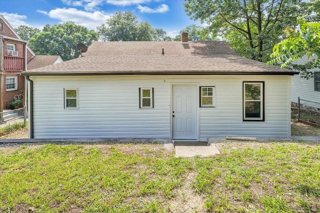 2109 Colgate St NE, Roanoke, VA 24012 - rear view of property with a chimney and a shingled roof