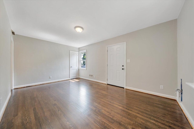 2109 Colgate St NE, Roanoke, VA 24012 - empty room with dark wood-style flooring and baseboards
