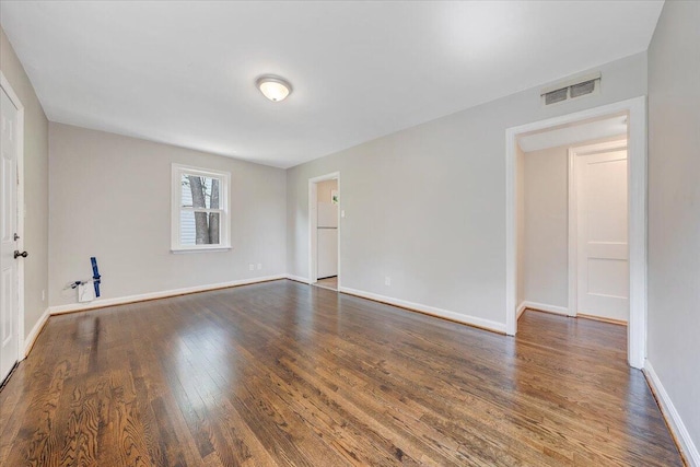 2109 Colgate St NE, Roanoke, VA 24012 - unfurnished room featuring wood finished floors and baseboards