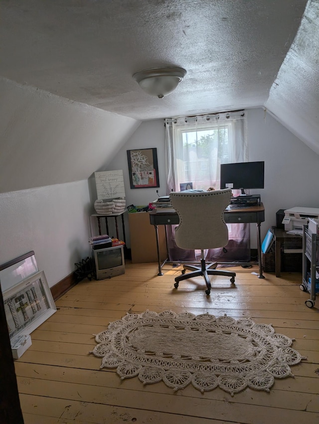 2221 W Main St, Salem, VA 24153 - home office featuring lofted ceiling, hardwood / wood-style flooring, and a textured ceiling