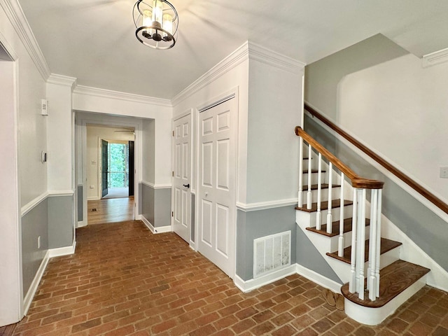 4867 Hunting Hills Dr, Roanoke, VA 24018 - entryway with brick flooring, baseboards, stairs, and ornamental molding