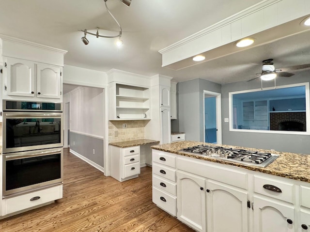 4867 Hunting Hills Dr, Roanoke, VA 24018 - kitchen with stainless steel appliances, open shelves, ceiling fan, white cabinetry, and stone countertops