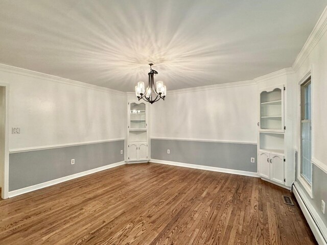 4867 Hunting Hills Dr, Roanoke, VA 24018 - unfurnished room featuring a baseboard heating unit, a chandelier, dark wood-style floors, ornamental molding, and baseboards