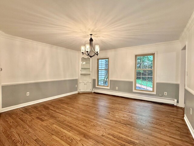 4867 Hunting Hills Dr, Roanoke, VA 24018 - empty room with baseboard heating, healthy amount of natural light, wood finished floors, a chandelier, and crown molding