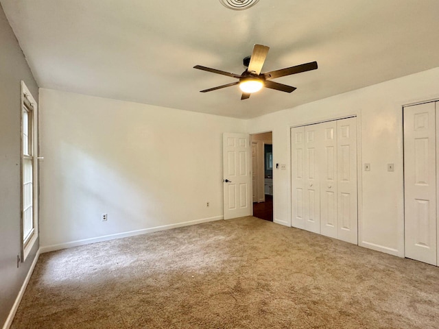 4867 Hunting Hills Dr, Roanoke, VA 24018 - unfurnished bedroom featuring carpet flooring, baseboards, and ceiling fan
