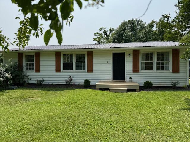 1465 Hardy Rd, Hardy, VA 24101 - single story home featuring a front yard and metal roof