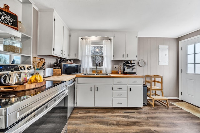 1465 Hardy Rd, Hardy, VA 24101 - kitchen featuring appliances with stainless steel finishes, a sink, wood counters, dark wood-type flooring, and crown molding