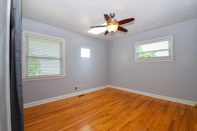 1008 Ridgecrest Dr, Roanoke, VA 24019 - empty room featuring ceiling fan, baseboards, and light wood-style floors