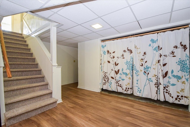1008 Ridgecrest Dr, Roanoke, VA 24019 - finished below grade area with a drop ceiling, stairway, wood finished floors, and baseboards