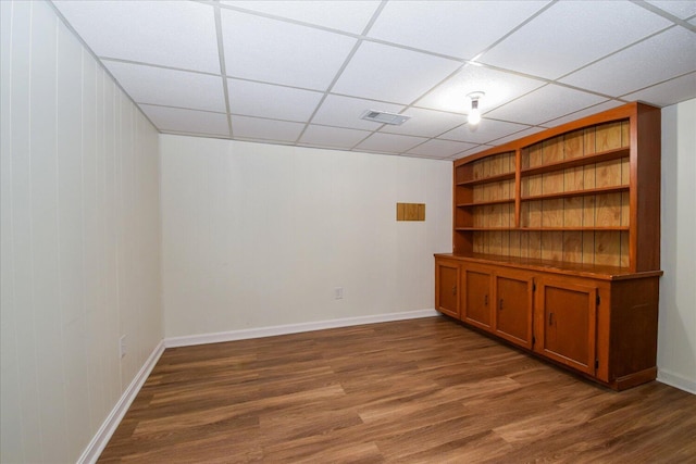 1008 Ridgecrest Dr, Roanoke, VA 24019 - spare room with wood finished floors, baseboards, a paneled ceiling, and wooden walls