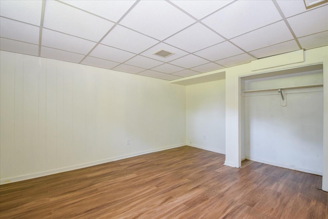 1008 Ridgecrest Dr, Roanoke, VA 24019 - unfurnished bedroom with a paneled ceiling, wood finished floors, a closet, and baseboards