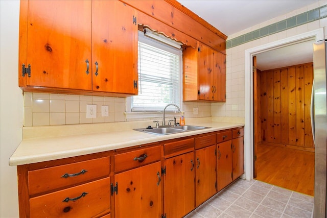 1008 Ridgecrest Dr, Roanoke, VA 24019 - kitchen featuring a sink, light countertops, backsplash, and freestanding refrigerator