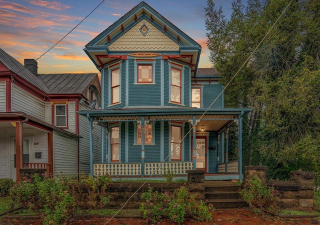 515 Elm Ave SW, Roanoke, VA 24016 - victorian home featuring a porch