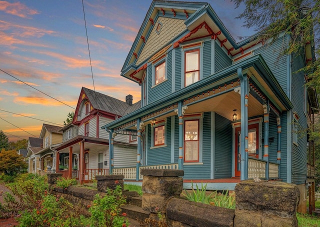 515 Elm Ave SW, Roanoke, VA 24016 - victorian house with covered porch