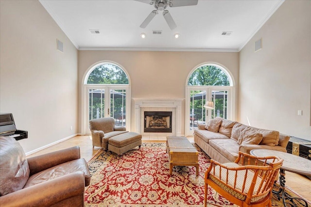 1425 Cravens Creek Ln SW, Roanoke, VA 24018 - living area with ornamental molding, healthy amount of natural light, ceiling fan, a premium fireplace, and baseboards