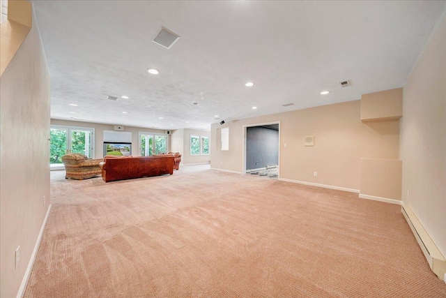 1425 Cravens Creek Ln SW, Roanoke, VA 24018 - unfurnished living room featuring light carpet, baseboards, recessed lighting, and a baseboard heating unit