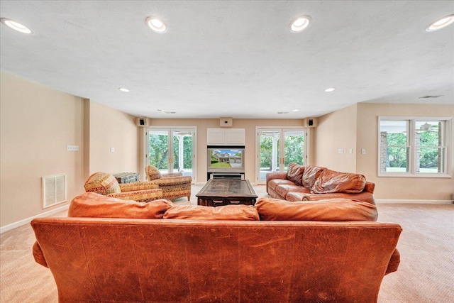 1425 Cravens Creek Ln SW, Roanoke, VA 24018 - living room featuring light colored carpet, baseboards, plenty of natural light, and recessed lighting