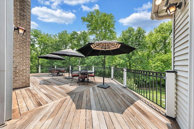 1425 Cravens Creek Ln SW, Roanoke, VA 24018 - wooden deck featuring outdoor dining area and view of scattered trees