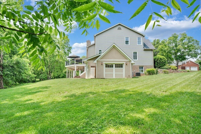 1425 Cravens Creek Ln SW, Roanoke, VA 24018 - rear view of property with a yard, a chimney, and brick siding