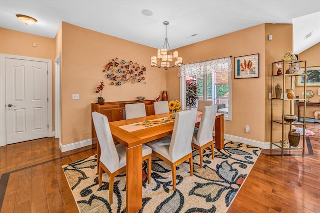 480 Winding Waters Dr, Moneta, VA 24121 - dining area featuring hardwood / wood-style flooring, a chandelier, and baseboards