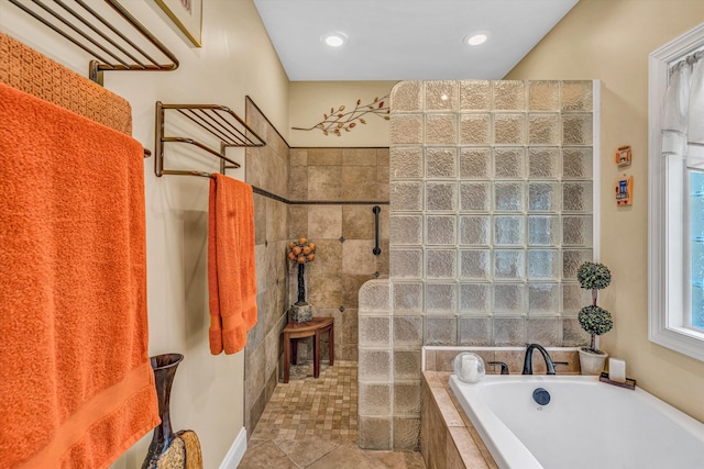 480 Winding Waters Dr, Moneta, VA 24121 - full bathroom with a garden tub, a walk in shower, and recessed lighting