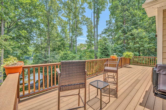 480 Winding Waters Dr, Moneta, VA 24121 - wooden terrace with view of wooded area