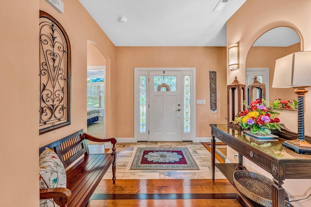480 Winding Waters Dr, Moneta, VA 24121 - foyer entrance featuring arched walkways, light wood-type flooring, and baseboards