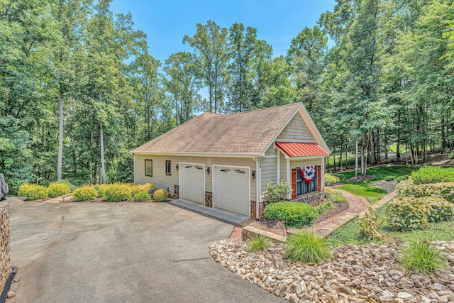 480 Winding Waters Dr, Moneta, VA 24121 - view of front facade featuring roof with shingles and a garage