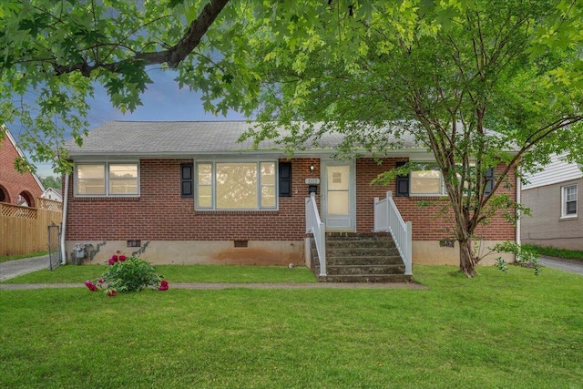 1113 Brandon Ave SW, Roanoke, VA 24015 - view of front of property featuring crawl space, brick siding, and a shingled roof