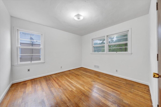 1113 Brandon Ave SW, Roanoke, VA 24015 - spare room with light wood finished floors and baseboards