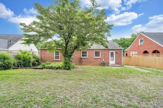 1113 Brandon Ave SW, Roanoke, VA 24015 - rear view of property with brick siding and central AC unit