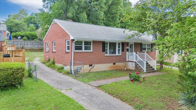 1113 Brandon Ave SW, Roanoke, VA 24015 - view of front facade featuring a shingled roof and brick siding