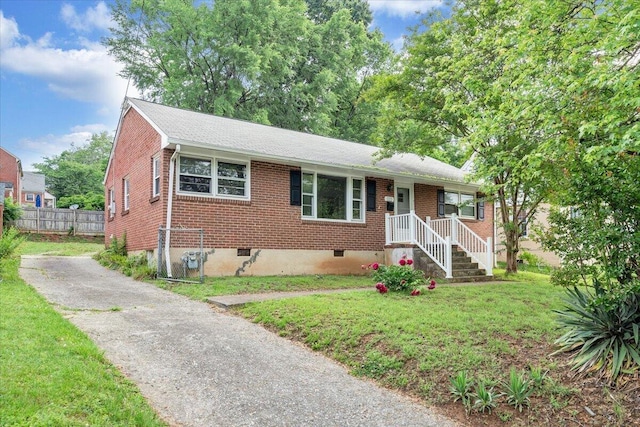 1113 Brandon Ave SW, Roanoke, VA 24015 - ranch-style home with brick siding, a shingled roof, and asphalt driveway