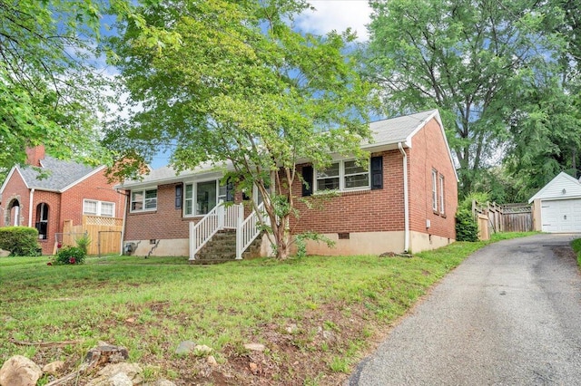 1113 Brandon Ave SW, Roanoke, VA 24015 - view of front of home with brick siding, an outbuilding, and a detached garage