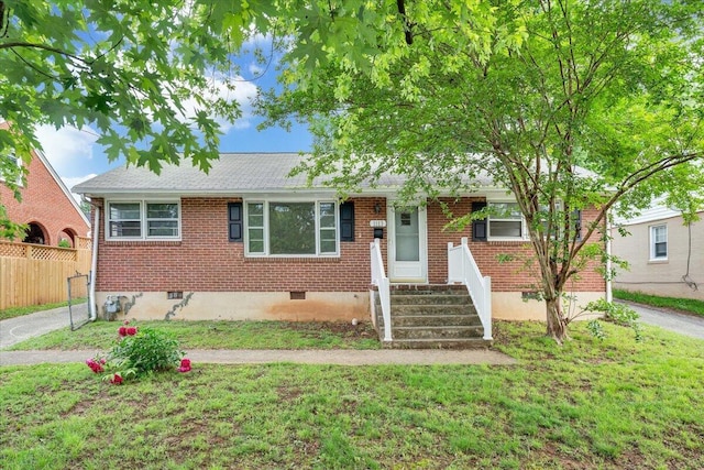 1113 Brandon Ave SW, Roanoke, VA 24015 - view of front of house featuring crawl space, brick siding, and roof with shingles