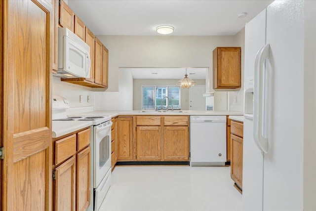 8506 Pine Hurst Cir, Roanoke, VA 24019 - kitchen featuring white appliances, a sink, and light countertops