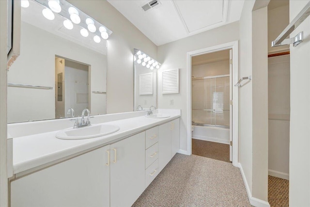 8506 Pine Hurst Cir, Roanoke, VA 24019 - full bathroom with double vanity, shower / bath combination with glass door, and baseboards