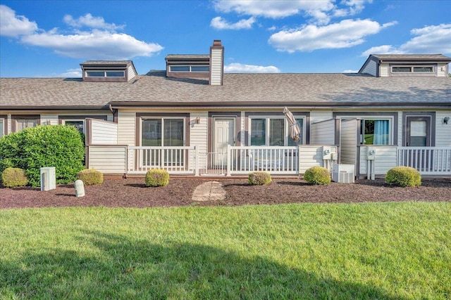 8506 Pine Hurst Cir, Roanoke, VA 24019 - view of front facade featuring covered porch, a front yard, a chimney, and roof with shingles