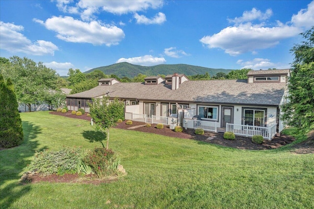 8506 Pine Hurst Cir, Roanoke, VA 24019 - view of front of home with a mountain view, a porch, and a front lawn
