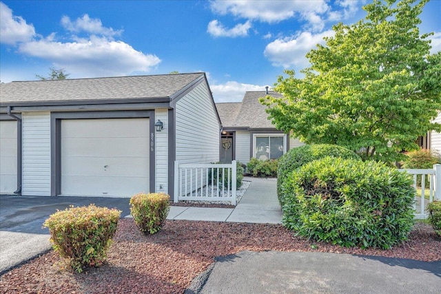 8506 Pine Hurst Cir, Roanoke, VA 24019 - view of front of home featuring a shingled roof and a garage