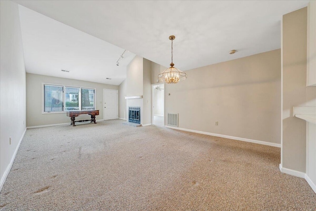 8506 Pine Hurst Cir, Roanoke, VA 24019 - unfurnished living room with lofted ceiling, light carpet, baseboards, heating unit, and a chandelier