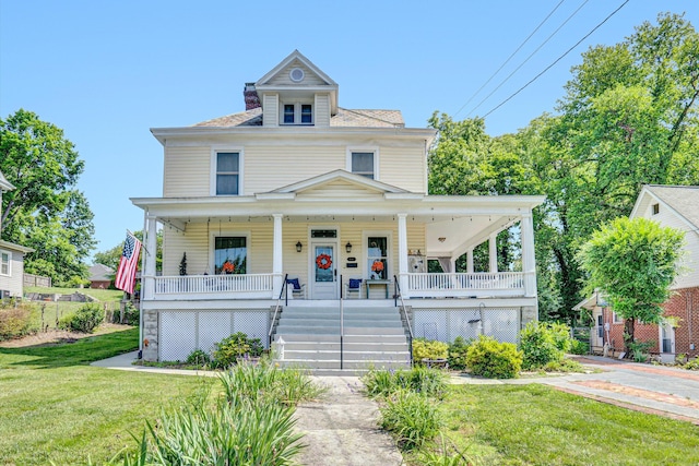 1921 Cambridge Ave SW, Roanoke, VA 24015 - american foursquare style home with a porch, stairs, and a front lawn