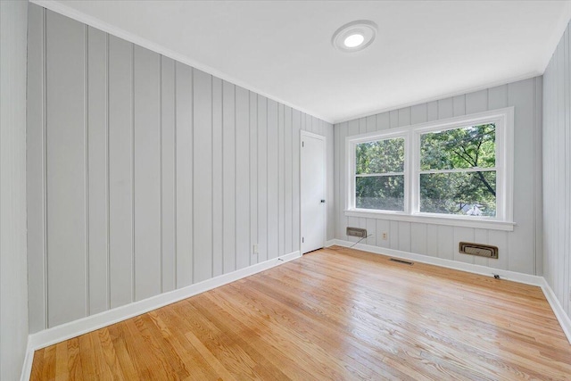 547 Dillard Rd SW, Roanoke, VA 24014 - spare room featuring light wood finished floors, baseboards, and ornamental molding