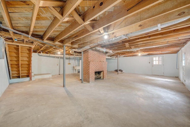 547 Dillard Rd SW, Roanoke, VA 24014 - basement featuring a brick fireplace