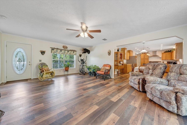 384 White Oak Ln, New Castle, VA 24127 - living area featuring wood finished floors, ceiling fan, and a textured ceiling